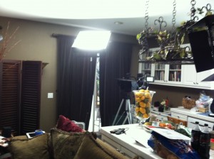 The "soundstage" of Mr. Deity: cameras and lights crammed into the kitchen, shooting into the living room