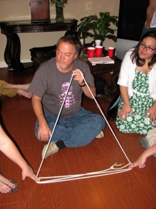 Mark Edward performing the "Triangle of Doom" at the Skepchicks TAM party